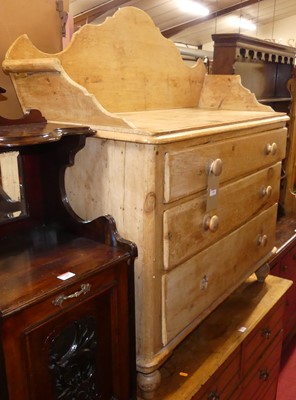 Lot 1401 - A Victorian pine three-quarter scroll gallery...