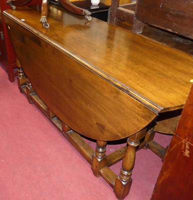 Lot 1413 - A contemporary joined oak wake table, having...