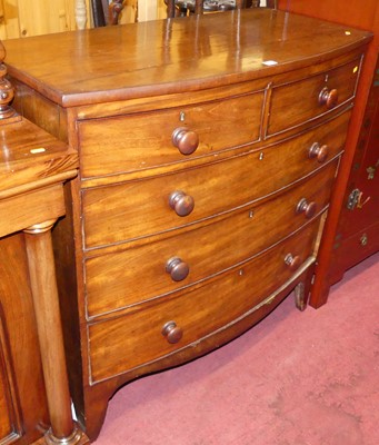 Lot 1417 - A Regency mahogany bowfront chest of two short...