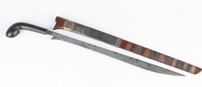 Lot 709 - An Eastern dagger, having a 36cm steel blade...