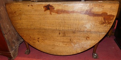 Lot 1432 - A 19th century oak drop leaf dining table