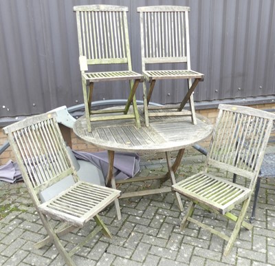 Lot 1434 - A slatted teak garden patio suite, comprising;...