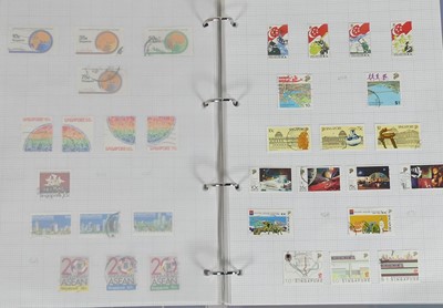 Lot 402 - Two boxes of world mint and postmarked stamps,...