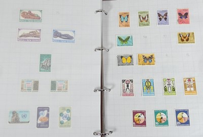 Lot 403 - Two boxes of world mint and postmarked stamps,...