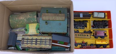 Lot 326 - A collection of mixed Hornby 0 gauge buildings,...