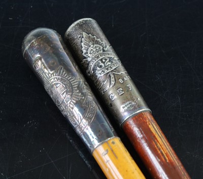 Lot 642 - A swagger stick, having a painted shaft and...