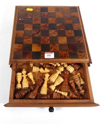 Lot 408 - A turned wooden thirty-two piece chess set,...