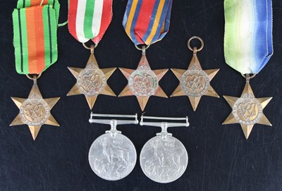 Lot 676 - A collection of seven WW II medals to include...