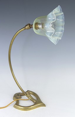 Lot 192 - An Art Nouveau brass desk lamp, having a...