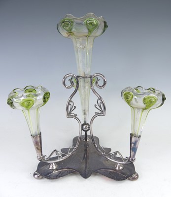 Lot 107 - An Art Nouveau silver plated four-branch...
