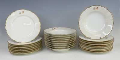 Lot 2039 - A French armorial porcelain part dinner...