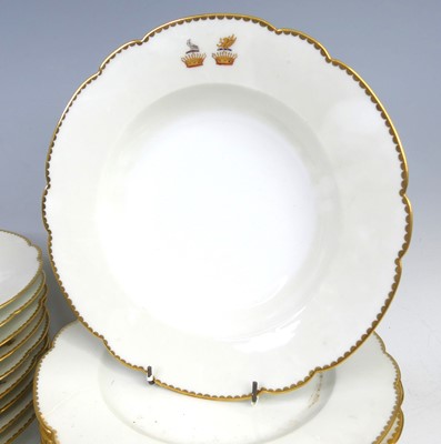 Lot 2039 - A French armorial porcelain part dinner...