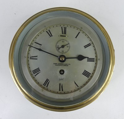 Lot 2470 - A Sestral brass ship's bulkhead clock, having...