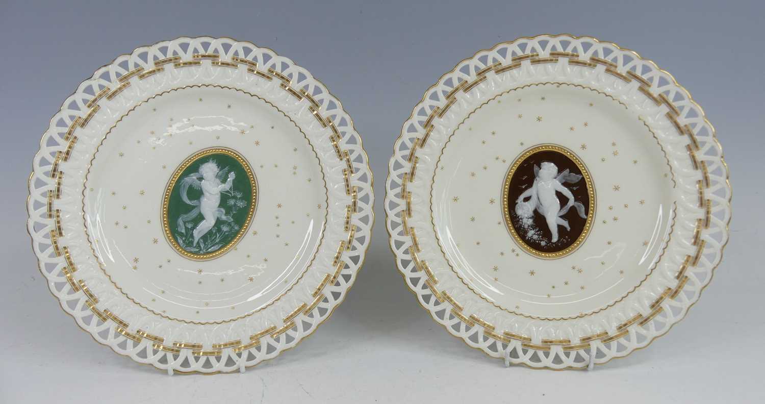 Lot 2040 - A pair of Mintons pate-sur-pate cabinet plates...