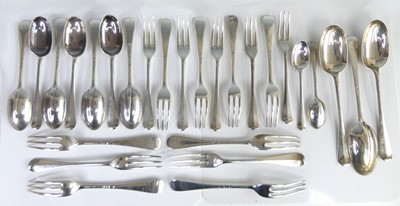 Lot 2219 - A part-suite of Edwardian silver flatwares, in...
