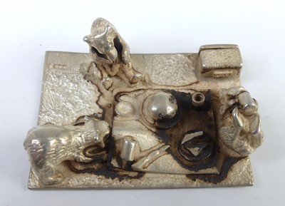 Lot 137 - A 1970s silver novelty menu holder, modelled...
