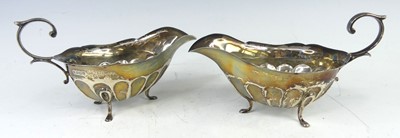 Lot 118 - A pair of early 20th century silver sauceboats,...