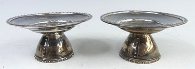 Lot 113 - A pair of Arts & Crafts silver pedestal bonbon...