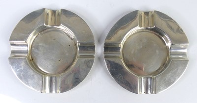Lot 130 - A pair of early Art Deco silver circular...