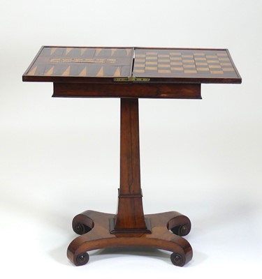 Lot 2506 - A George IV rosewood pedestal games table, the...