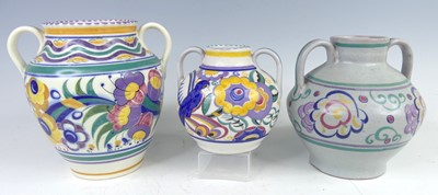 Lot 17 - A 1930s Poole Pottery twin handled baluster...