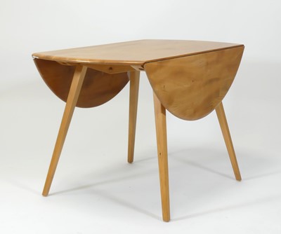 Lot 379 - An Ercol blond elm and beech dropflap 'Windsor'...