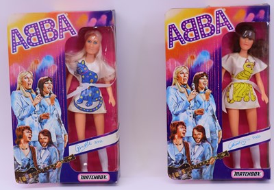 Lot 1332 - A pair of Matchbox Abba dolls, both housed in...