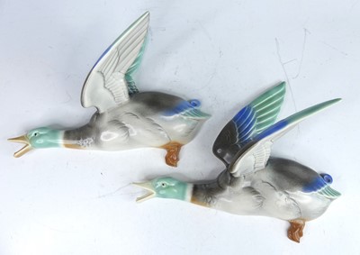 Lot 34 - A pair of Poole Pottery wall-mounted flying...