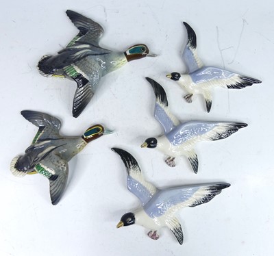 Lot 37 - Two Beswick pottery wall-mounted flying teals,...