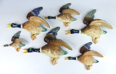 Lot 40 - A group of six Falconware pottery wall-mounted...