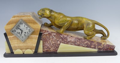 Lot 186 - A large Art Deco multi-marble mantel clock,...
