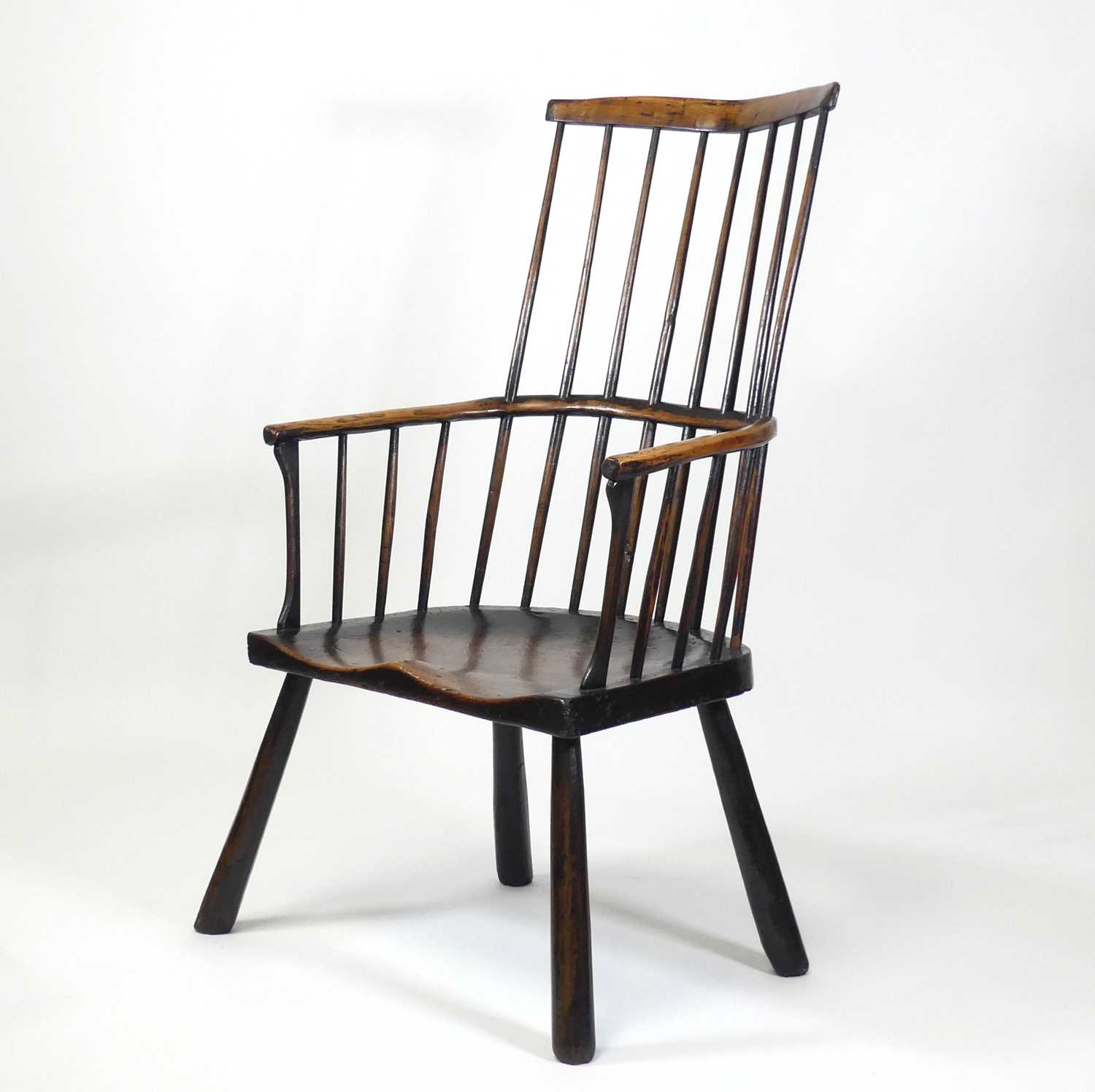 Lot 2505 - An 18th century oak seat and ash comb-back...