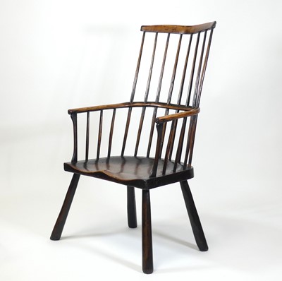 Lot 2505 - An 18th century oak seat and ash comb-back...