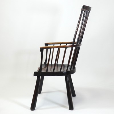 Lot 2505 - An 18th century oak seat and ash comb-back...