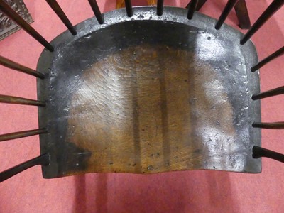 Lot 2505 - An 18th century oak seat and ash comb-back...