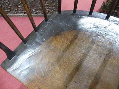 Lot 2505 - An 18th century oak seat and ash comb-back...