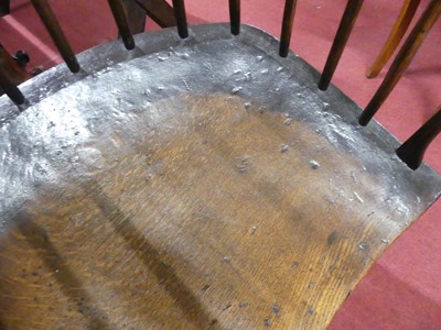 Lot 2505 - An 18th century oak seat and ash comb-back...