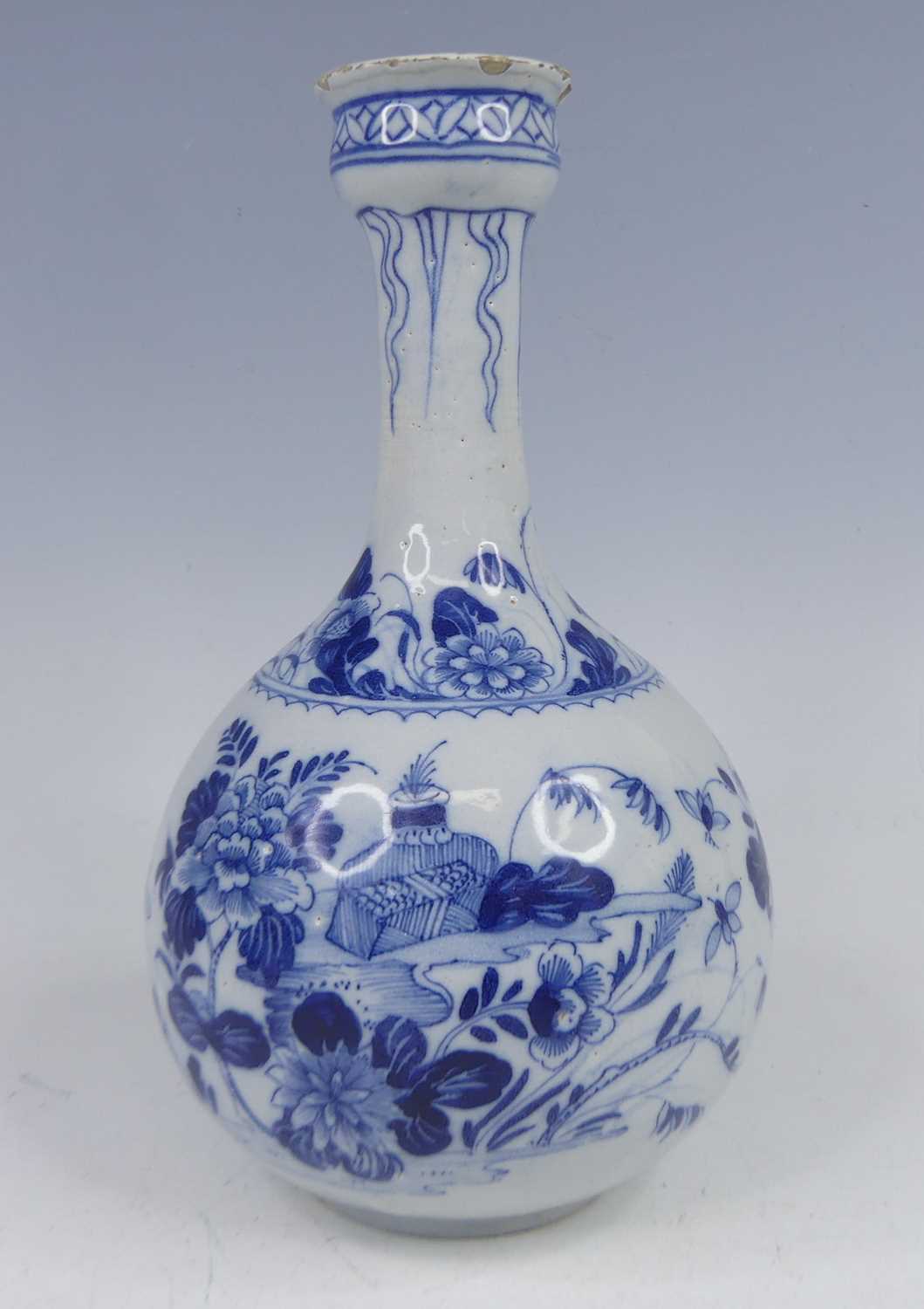 Lot 2025 - An 18th century Dutch Delft garlic-neck bottle...