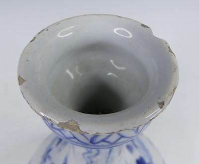 Lot 2025 - An 18th century Dutch Delft garlic-neck bottle...
