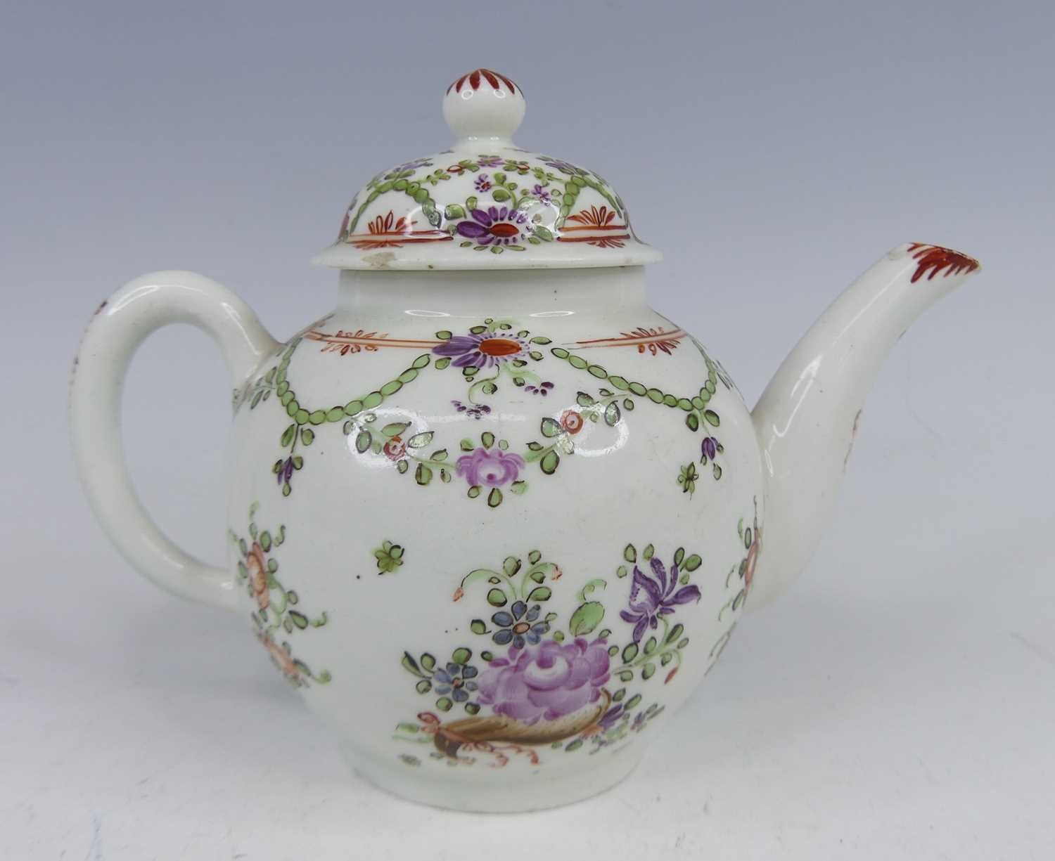Lot 2028 - A Lowestoft porcelain teapot and cover, circa...