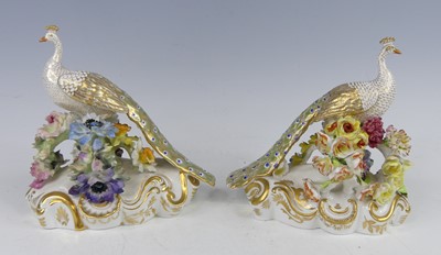 Lot 2044 - A pair of Royal Crown Derby porcelain peacocks,...
