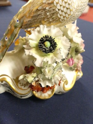 Lot 2044 - A pair of Royal Crown Derby porcelain peacocks,...