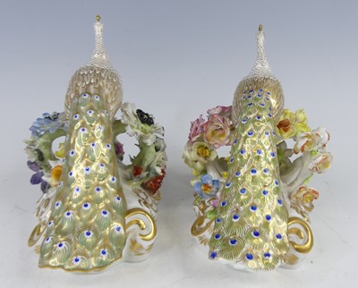 Lot 2044 - A pair of Royal Crown Derby porcelain peacocks,...