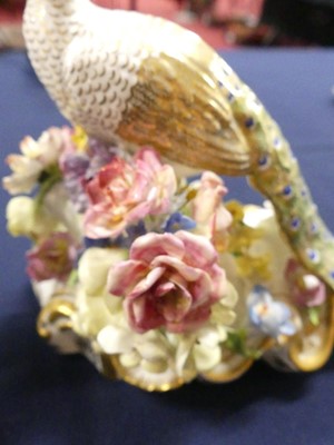 Lot 2044 - A pair of Royal Crown Derby porcelain peacocks,...