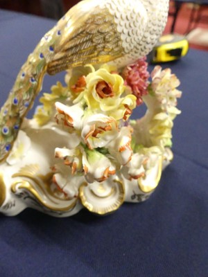 Lot 2044 - A pair of Royal Crown Derby porcelain peacocks,...