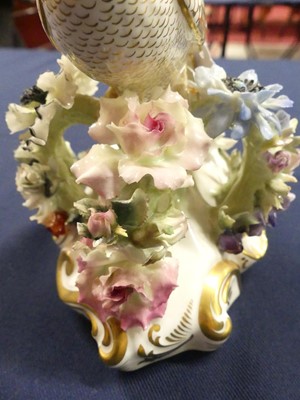 Lot 2044 - A pair of Royal Crown Derby porcelain peacocks,...