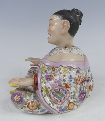 Lot 2048 - A circa 1900 continental porcelain nodding...