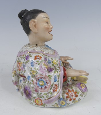 Lot 2048 - A circa 1900 continental porcelain nodding...