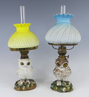 Lot 2340 - A matched pair of late Victorian owl porcelain...