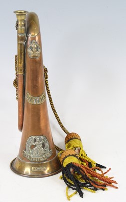 Lot 615 - An early 20th century copper bugle, with...
